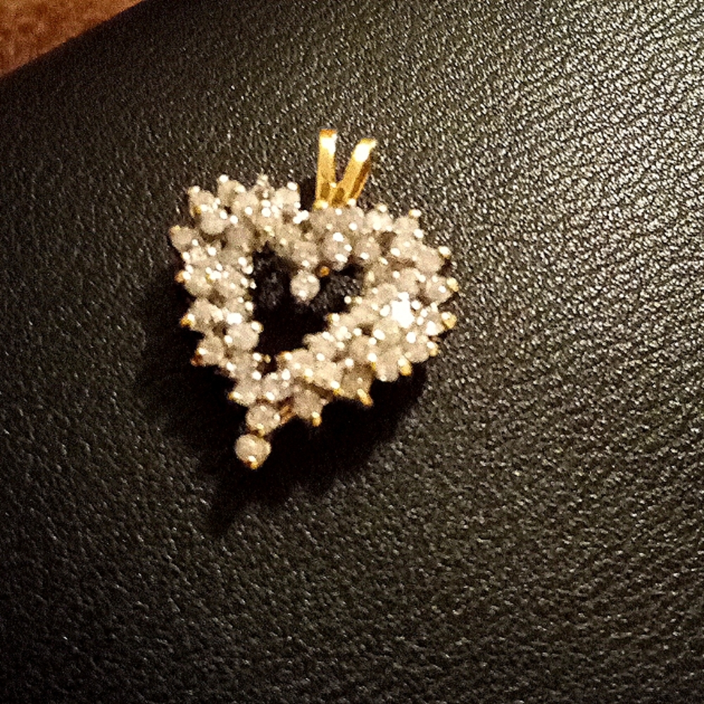 Gold heart pendant with diamonds